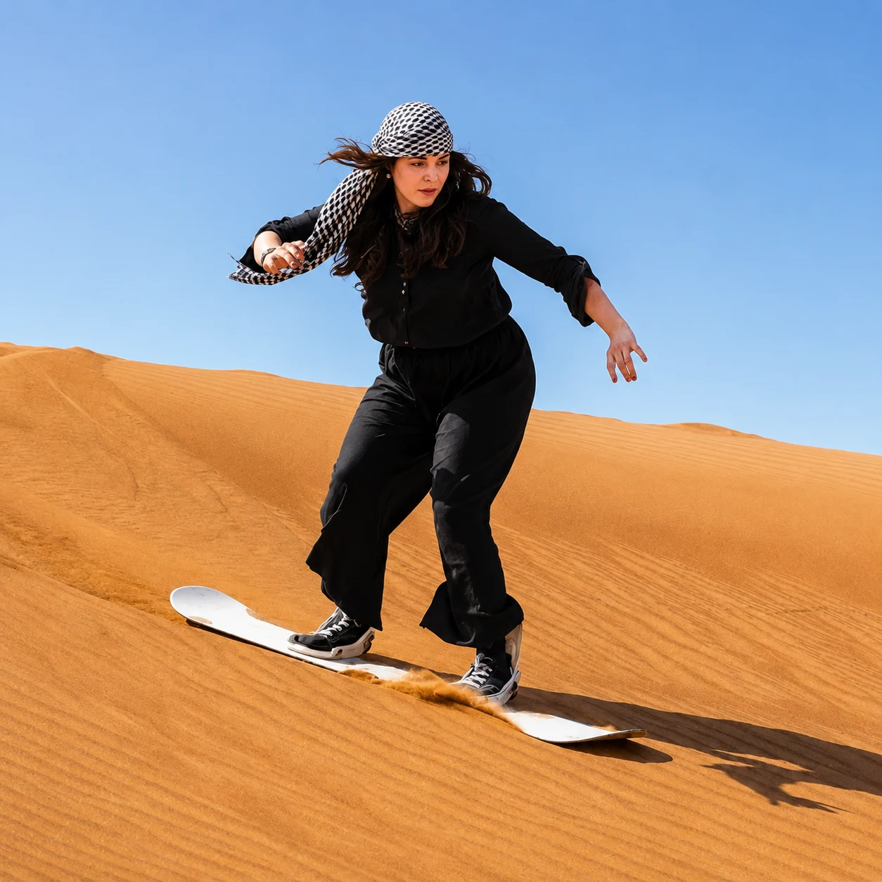 Girls sandboarding adventure in Dubai