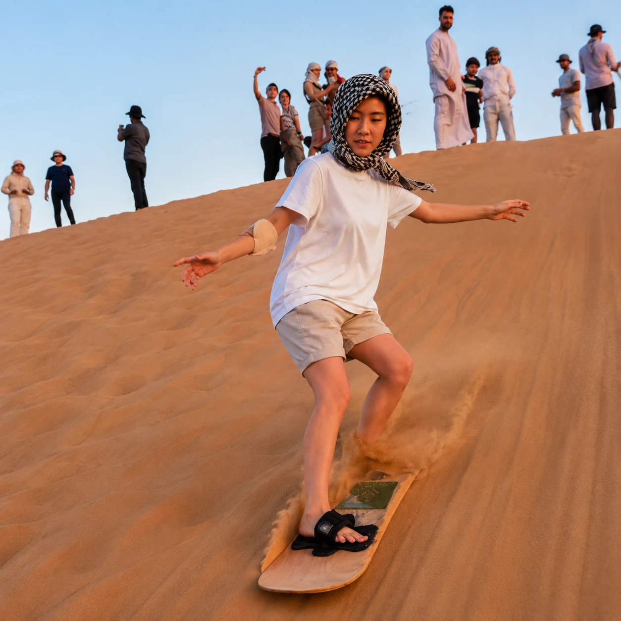 Desert Sandboarding Adventure Dubai - Glide down the red dunes with Desert Safari Experts